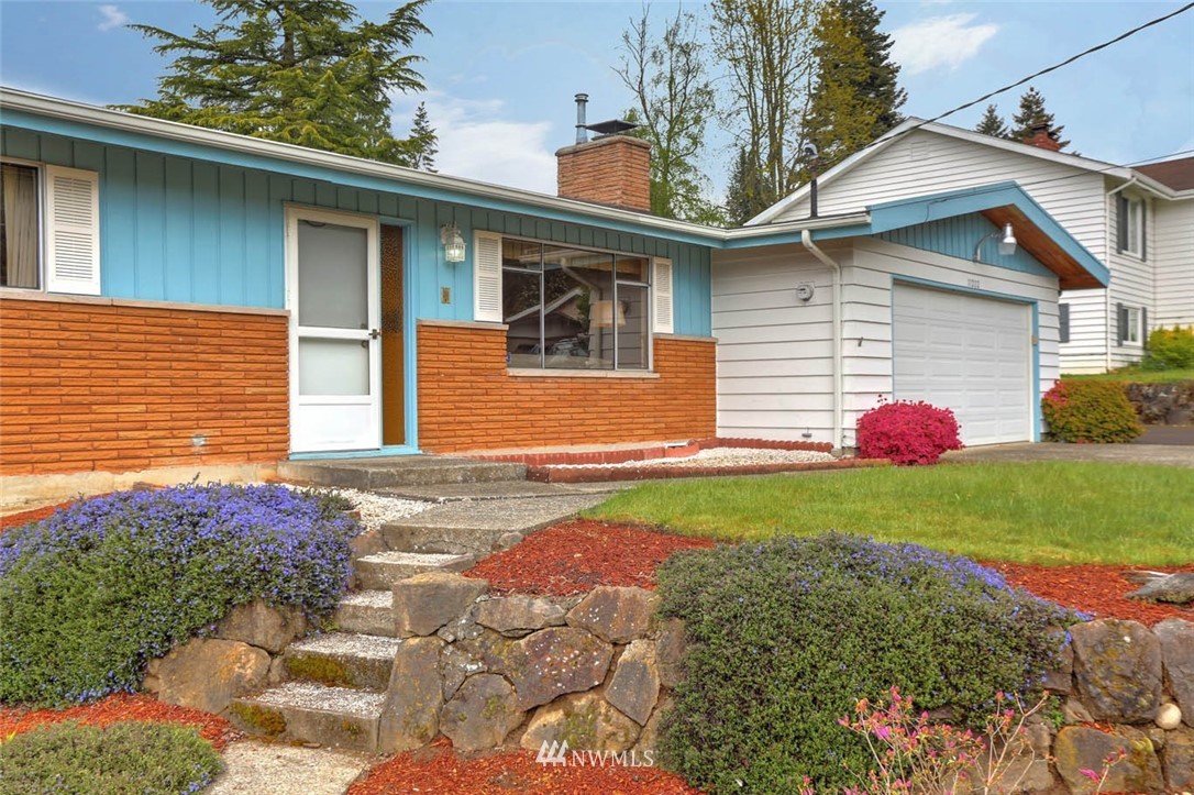 11222 Southeast 182nd Street Renton, WA 98055 - Photo 2 of 24 a front view of a house