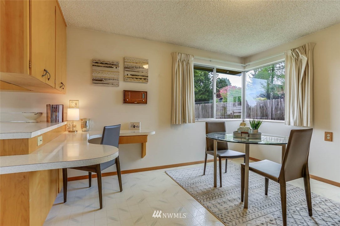 11222 Southeast 182nd Street Renton, WA 98055 - Photo 12 of 24 a workspace with furniture and a window