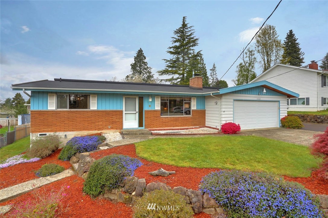 11222 Southeast 182nd Street Renton, WA 98055 - Photo 24 of 24 a view of a house with a yard