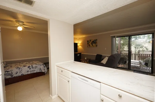 a bed room with a bed and a night stand