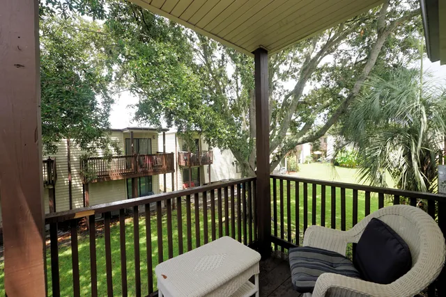 a view of a two chairs in the deck