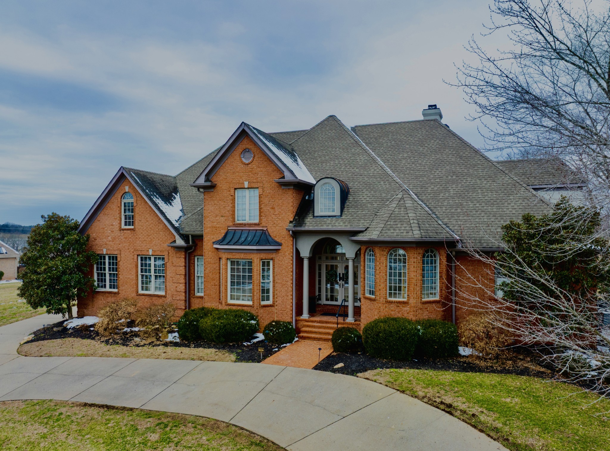 156 Eagle Pointe Springfield, TN 37172 - Photo 1 of 36 a front view of a house with garden