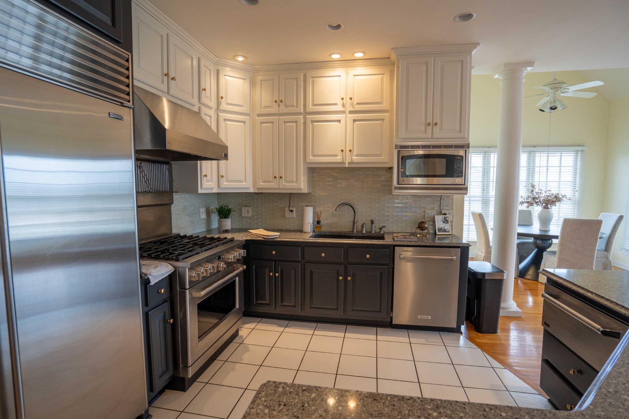 156 Eagle Pointe Springfield, TN 37172 - Photo 11 of 36 a kitchen with stainless steel appliances granite countertop a sink stove and refrigerator