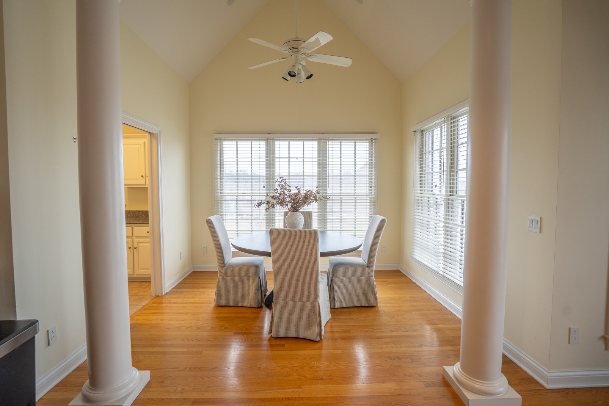 156 Eagle Pointe Springfield, TN 37172 - Photo 12 of 36 a view of a dining room with furniture a chandelier and wooden floor