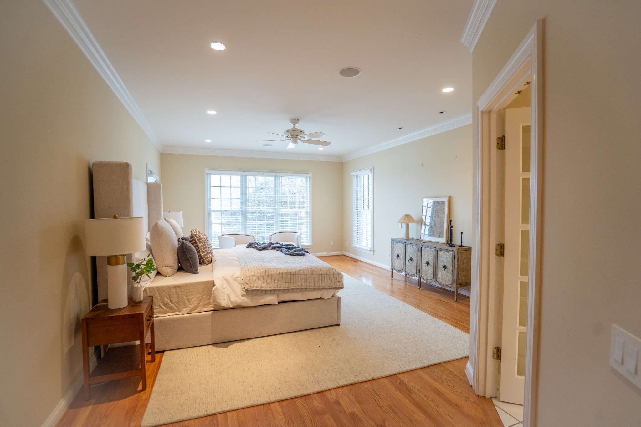 156 Eagle Pointe Springfield, TN 37172 - Photo 15 of 36 a bedroom with a bed a table and flat screen tv