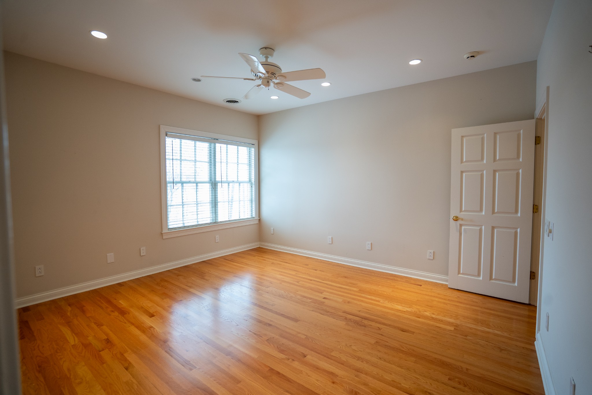 156 Eagle Pointe Springfield, TN 37172 - Photo 23 of 36 a view of an empty room with wooden floor and a window