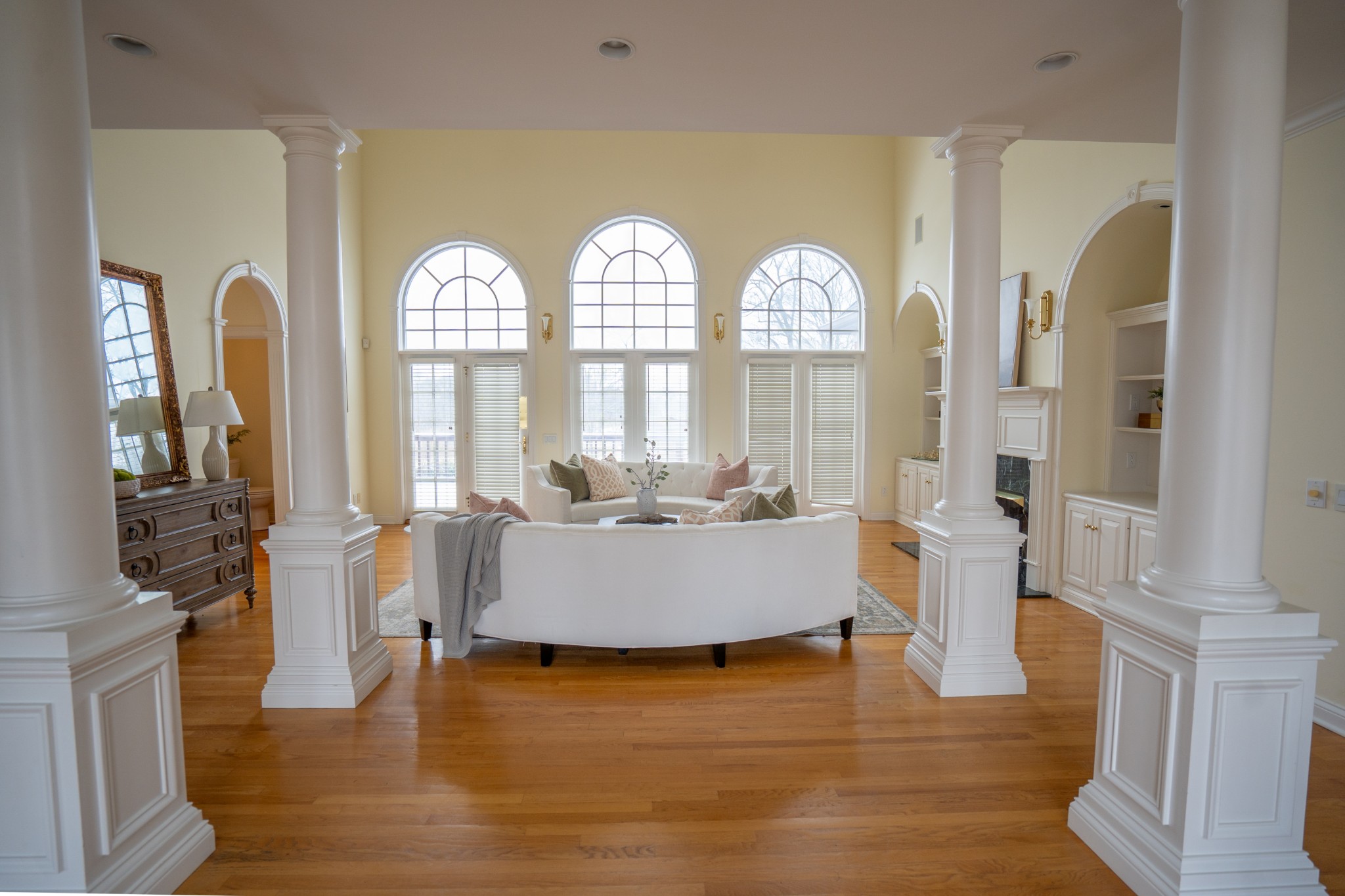 156 Eagle Pointe Springfield, TN 37172 - Photo 3 of 36 a living room with couches a mirror and a large window with wooden floor