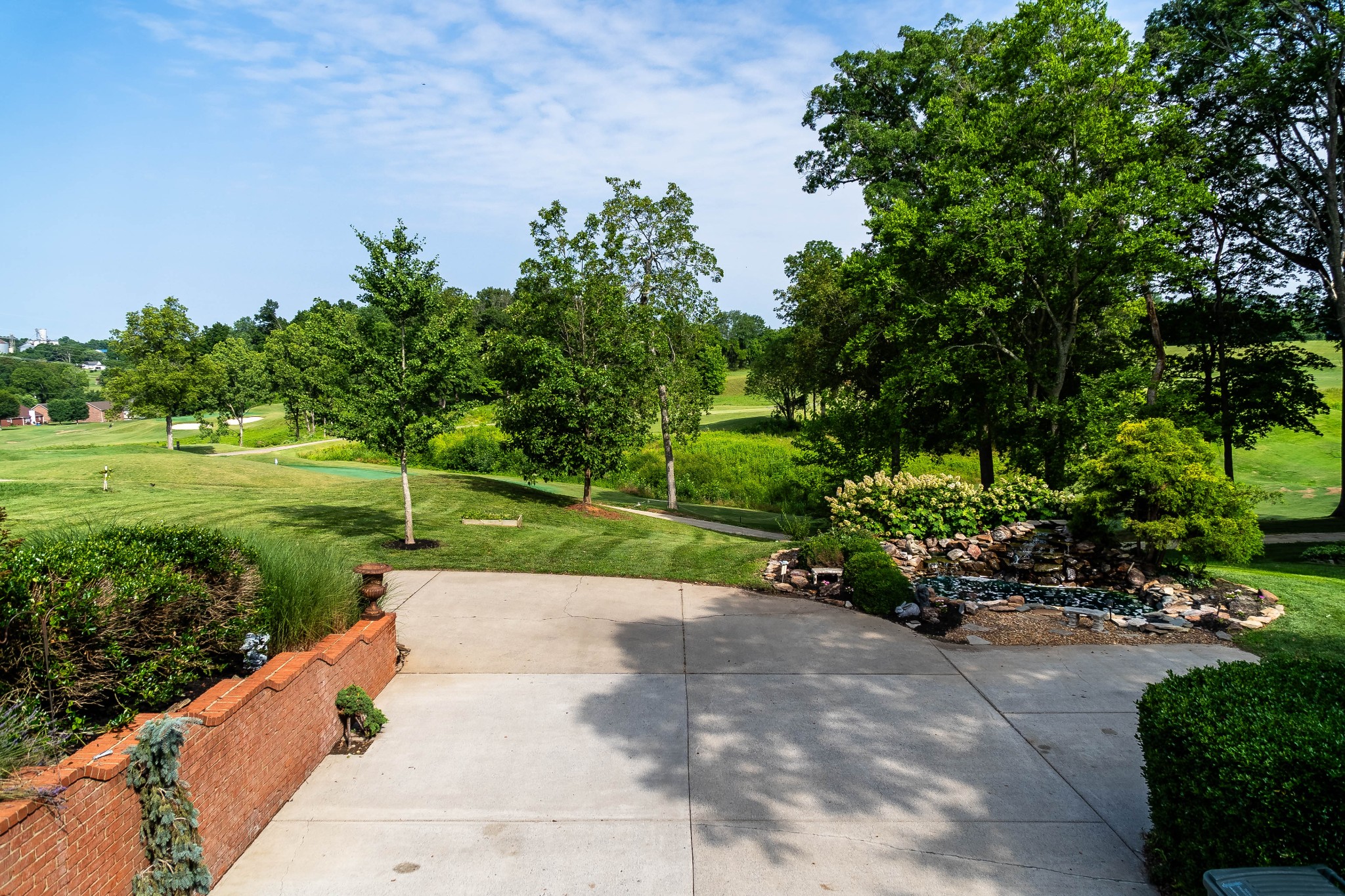 156 Eagle Pointe Springfield, TN 37172 - Photo 33 of 36 a view of a garden with a bench