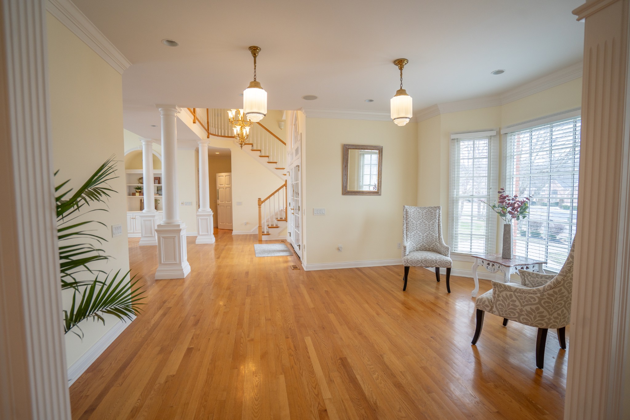 156 Eagle Pointe Springfield, TN 37172 - Photo 6 of 36 a view of a room with wooden floor potted plant and windows