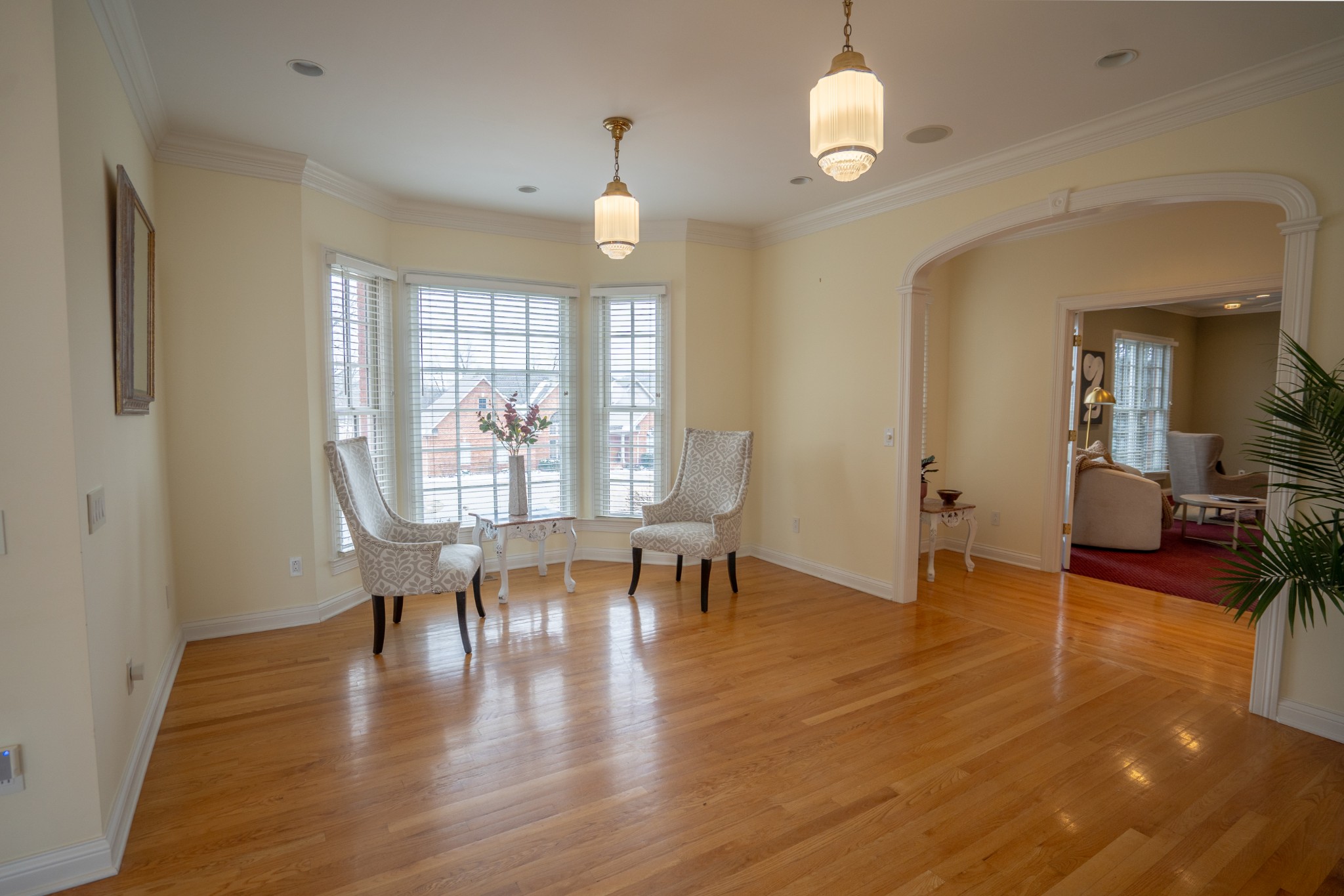 156 Eagle Pointe Springfield, TN 37172 - Photo 7 of 36 a view of a dining room with furniture window and wooden floor