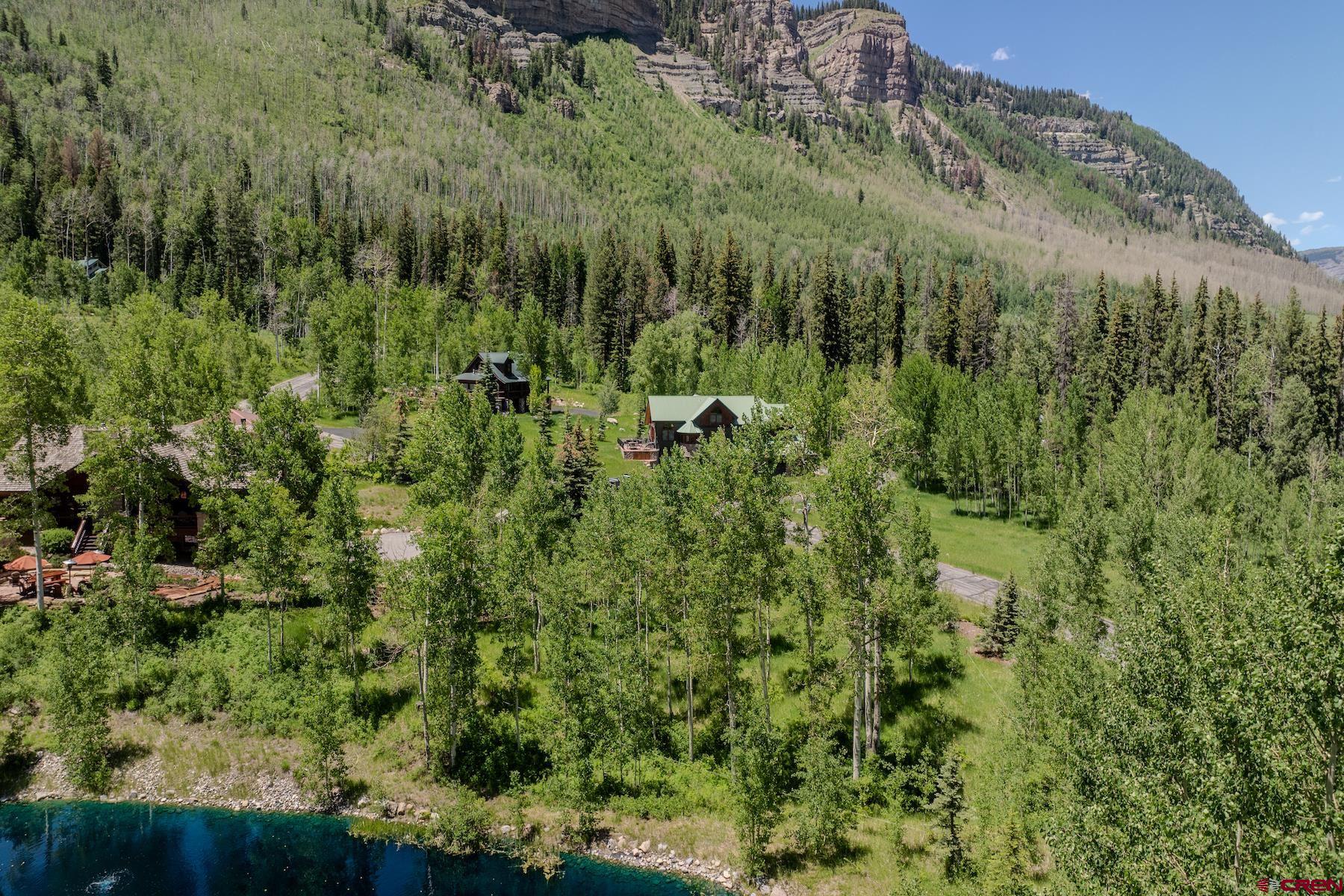 75 Falcon Ridge Road Durango, CO 81301 - Photo 15 of 27 a view of a lush green forest with lots of trees