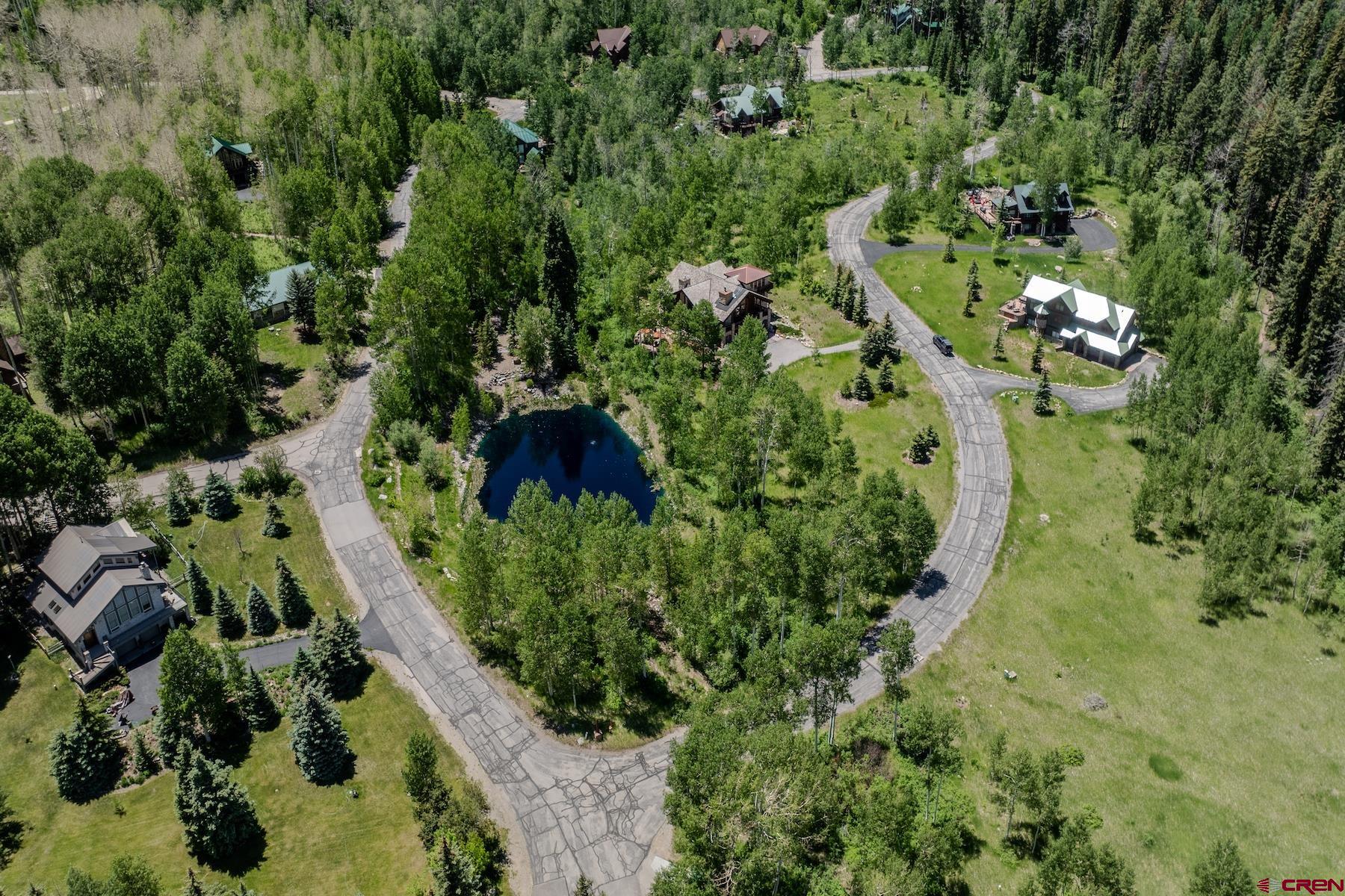 75 Falcon Ridge Road Durango, CO 81301 - Photo 23 of 27 an aerial view of residential house with outdoor space and trees all around