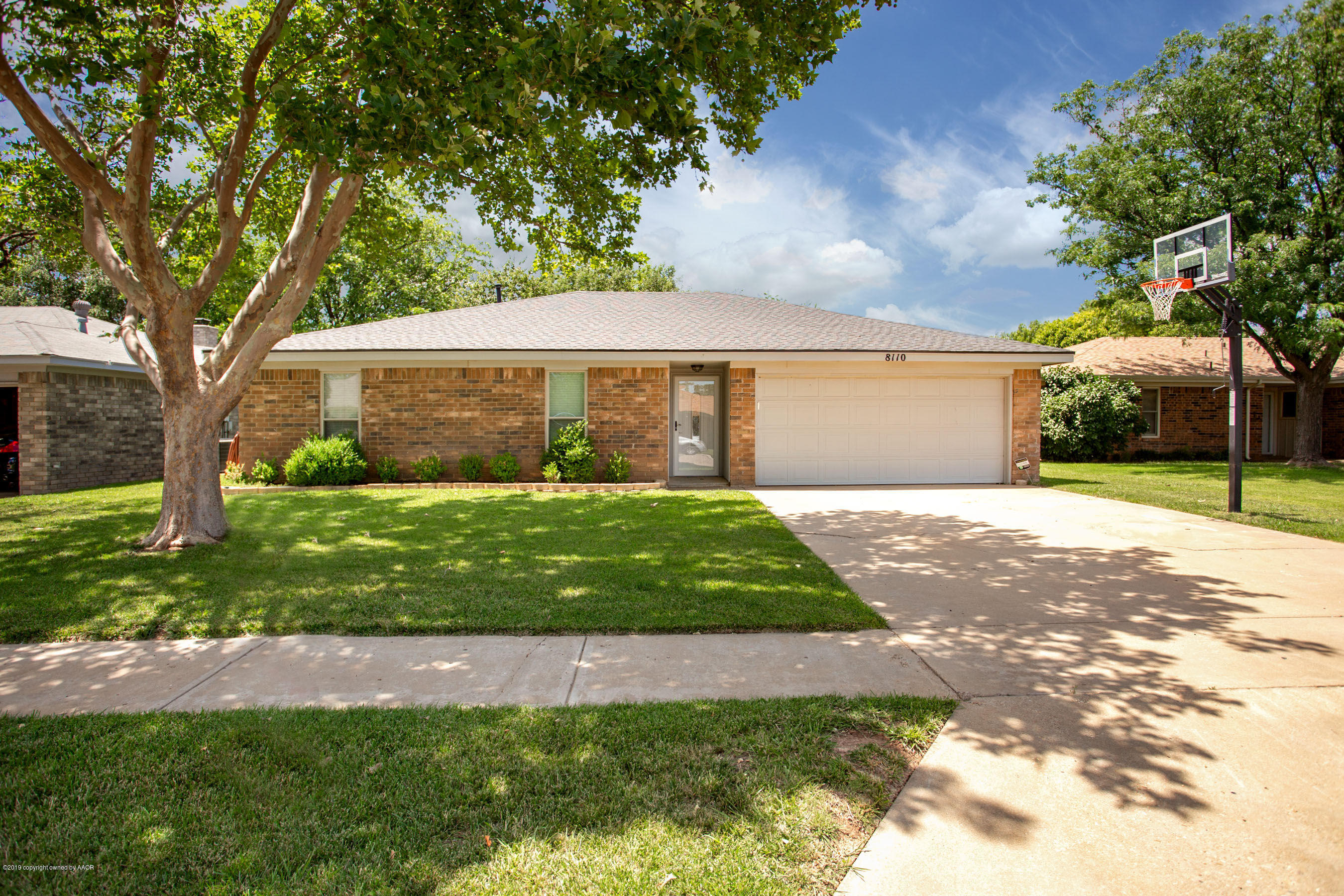 8110 Santa Fe Trail Amarillo, TX 79110 - Photo 1 of 25 a front view of a house with garden