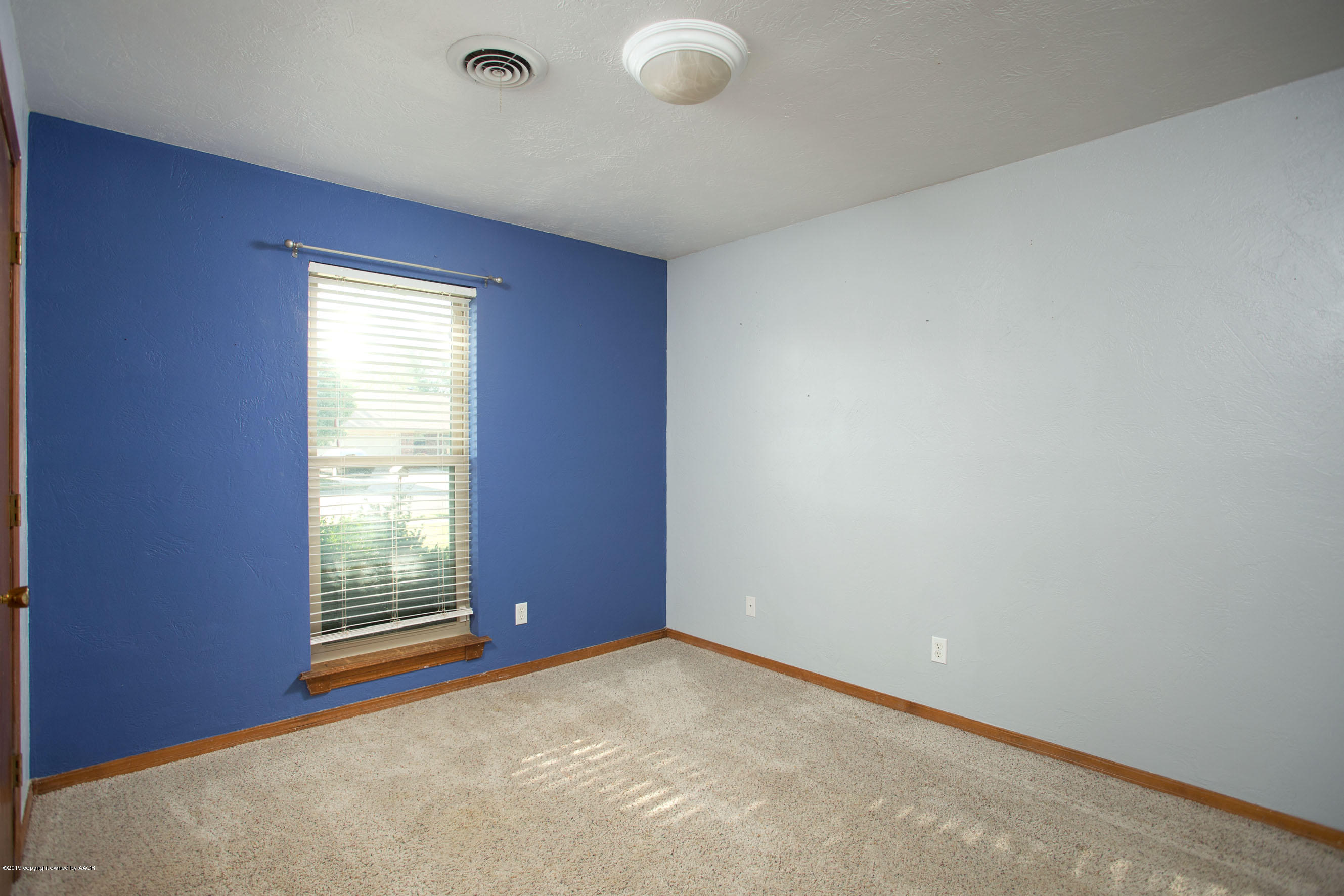 8110 Santa Fe Trail Amarillo, TX 79110 - Photo 18 of 25 an empty room with windows