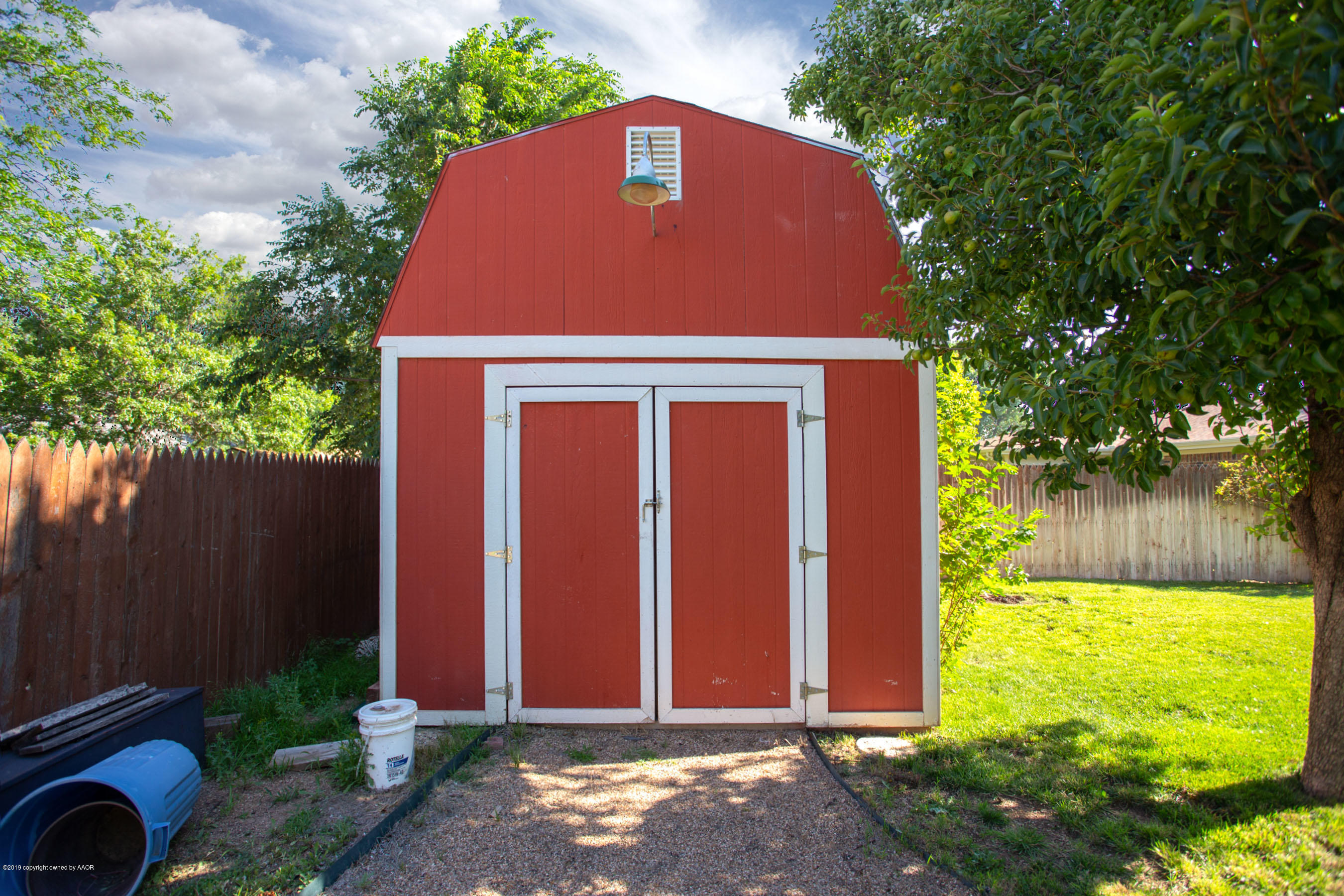 8110 Santa Fe Trail Amarillo, TX 79110 - Photo 21 of 25 a front view of a house with garden