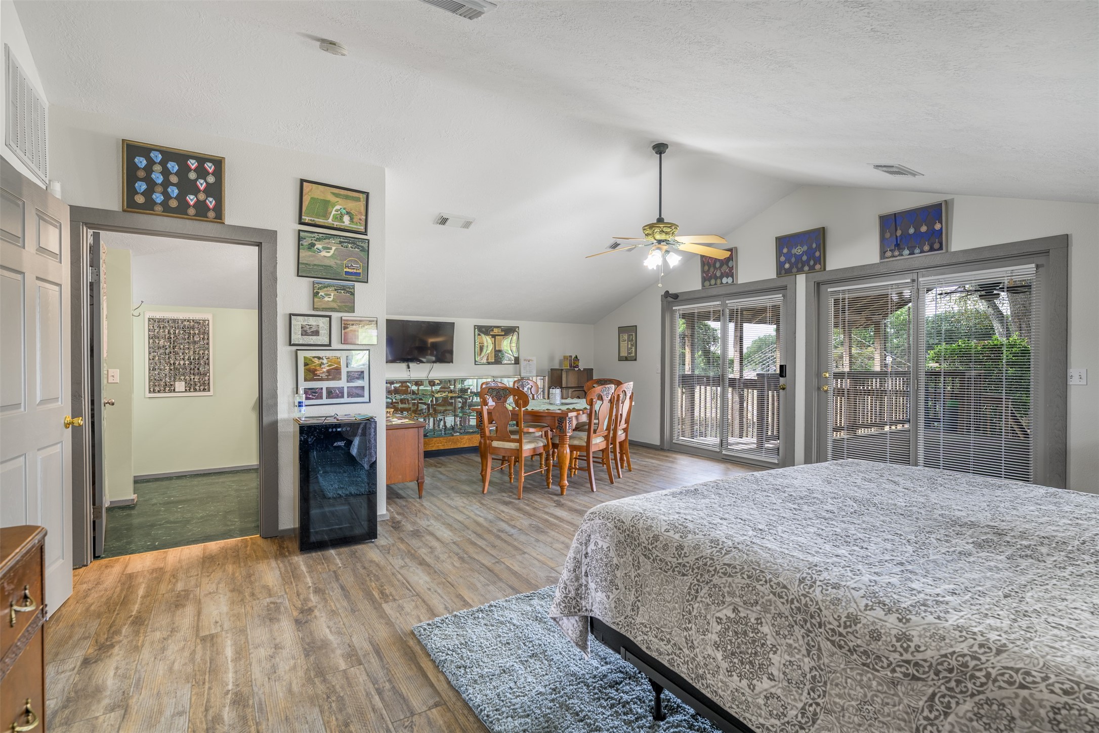 1441 Salem Road Brenham, TX 77833 - Photo 16 of 34 a living room with furniture a dining table and a large window