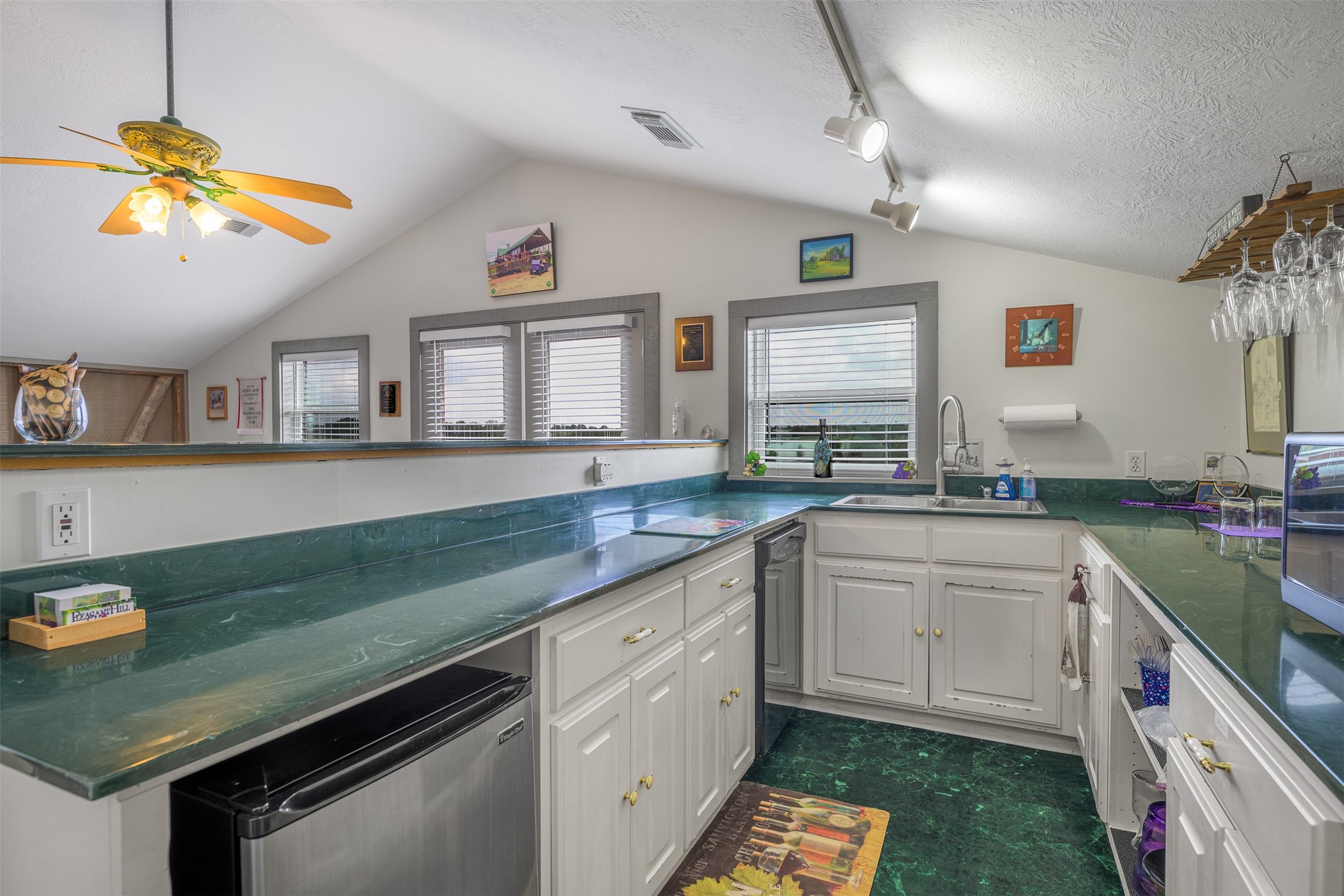 1441 Salem Road Brenham, TX 77833 - Photo 24 of 34 a kitchen with a sink cabinets and window