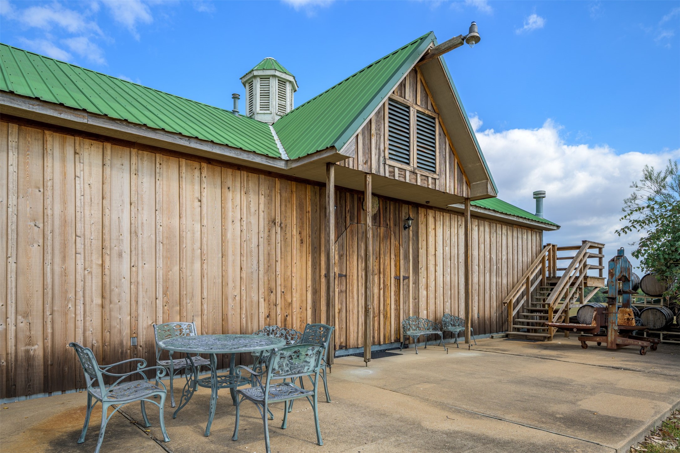 1441 Salem Road Brenham, TX 77833 - Photo 29 of 34 a backyard of a house with table and chairs
