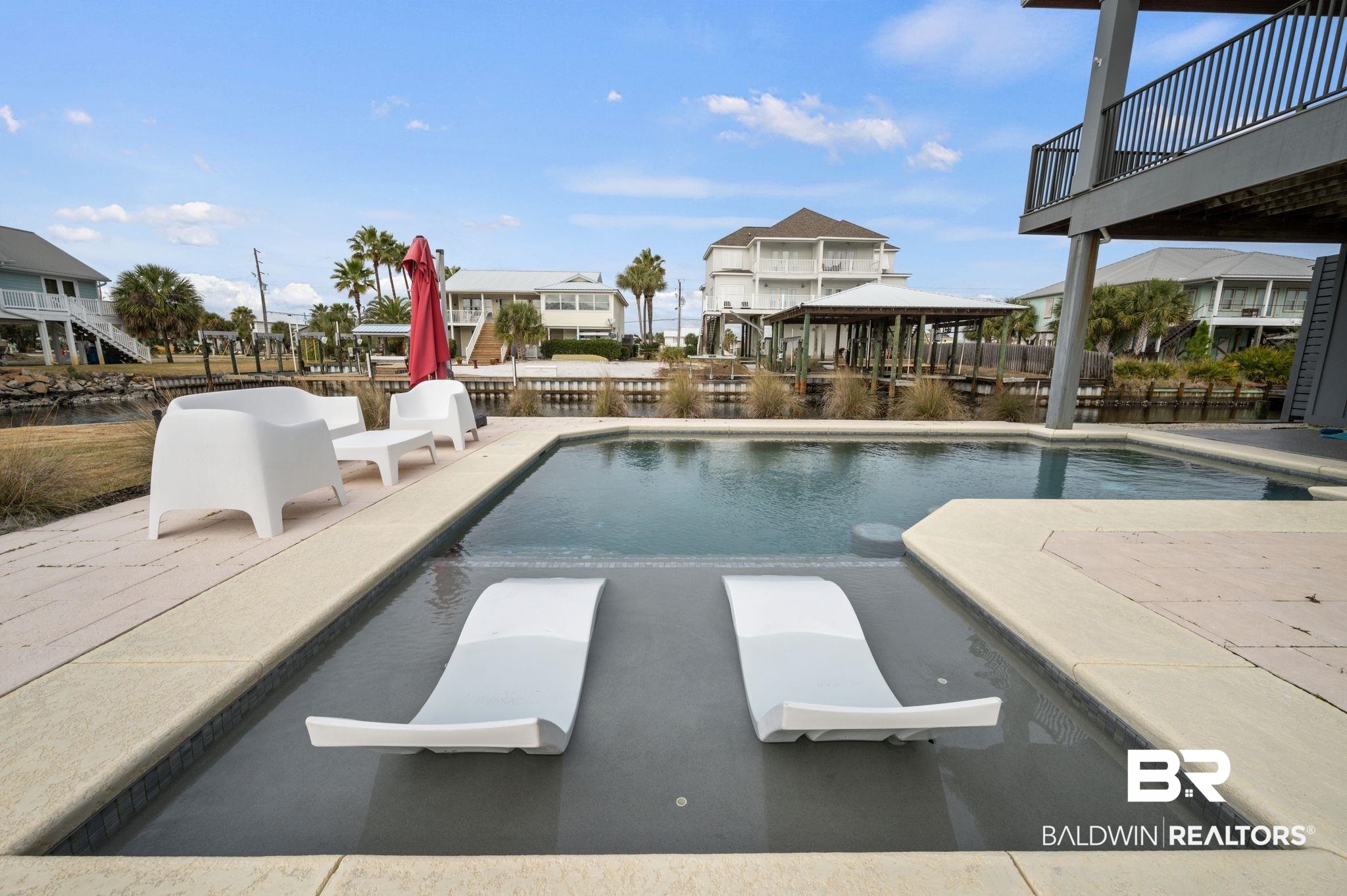 3840 Cotton Way Orange Beach, AL 36561 - Photo 48 of 75 View of swimming pool featuring a gazebo and a patio area