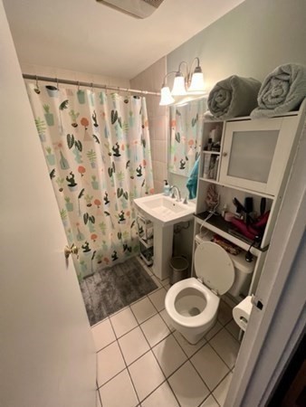93 East Brookline Street, Unit 2 Boston, MA 02118 - Photo 3 of 8 a bathroom with a sink toilet and shower