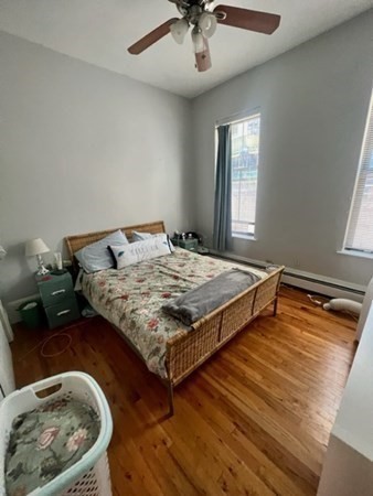 93 East Brookline Street, Unit 2 Boston, MA 02118 - Photo 6 of 8 a bedroom with a bed and window