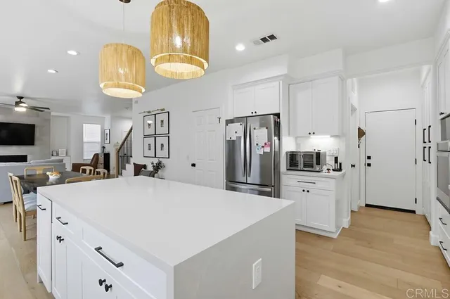 a bathroom with a shower and a sink