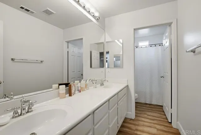 a view of a chairs and table in the patio