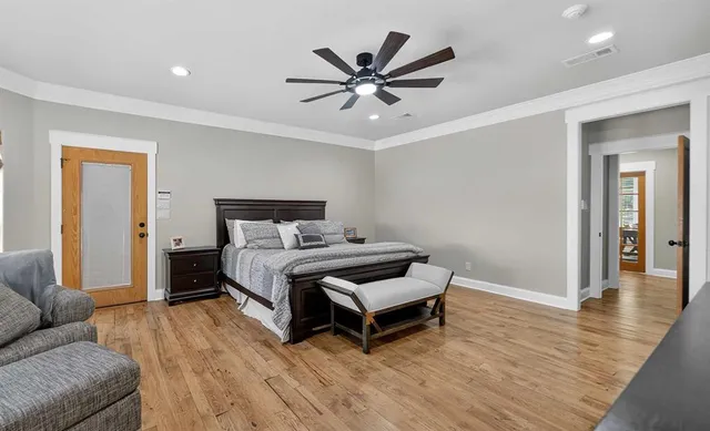 a bed room with a bed and a couch