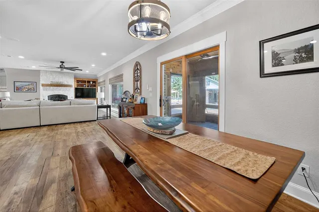 a view of kitchen with kitchen island and stainless steel appliances