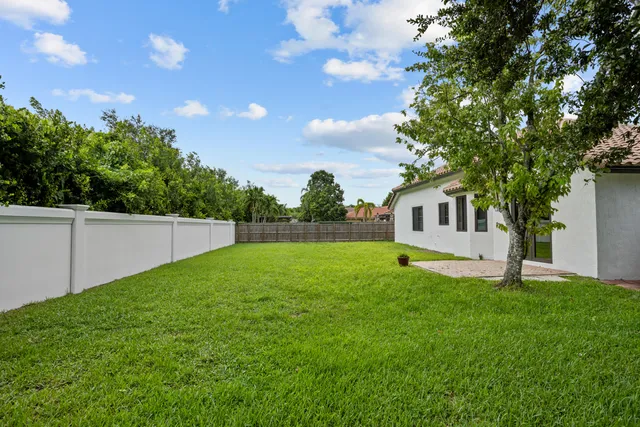 a view of a backyard with a garden