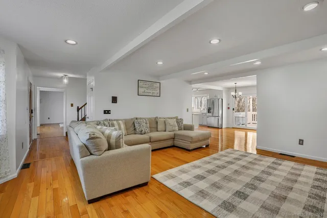 a living room with furniture and a couch