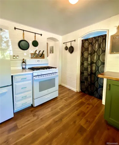 a kitchen with a stove and a cabinet