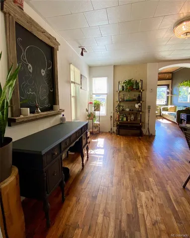 a view of a living room and dining room