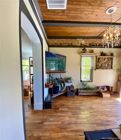 a view of a living room and bathroom