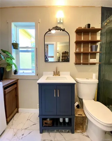 a bathroom with a sink and a toilet