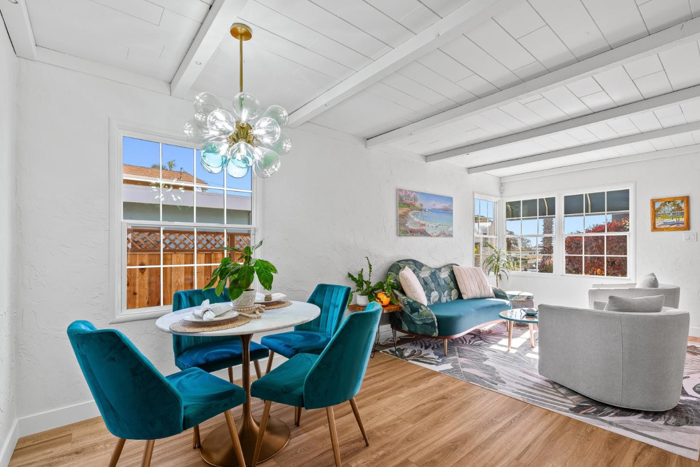 320 Hillcrest Drive Aptos, CA 95003 - Photo 11 of 36 a view of a dining room with furniture wooden floor and a chandelier