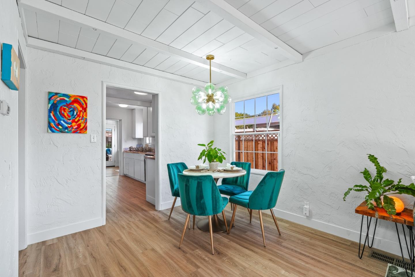 320 Hillcrest Drive Aptos, CA 95003 - Photo 12 of 36 a view of a dining room with furniture window and wooden floor