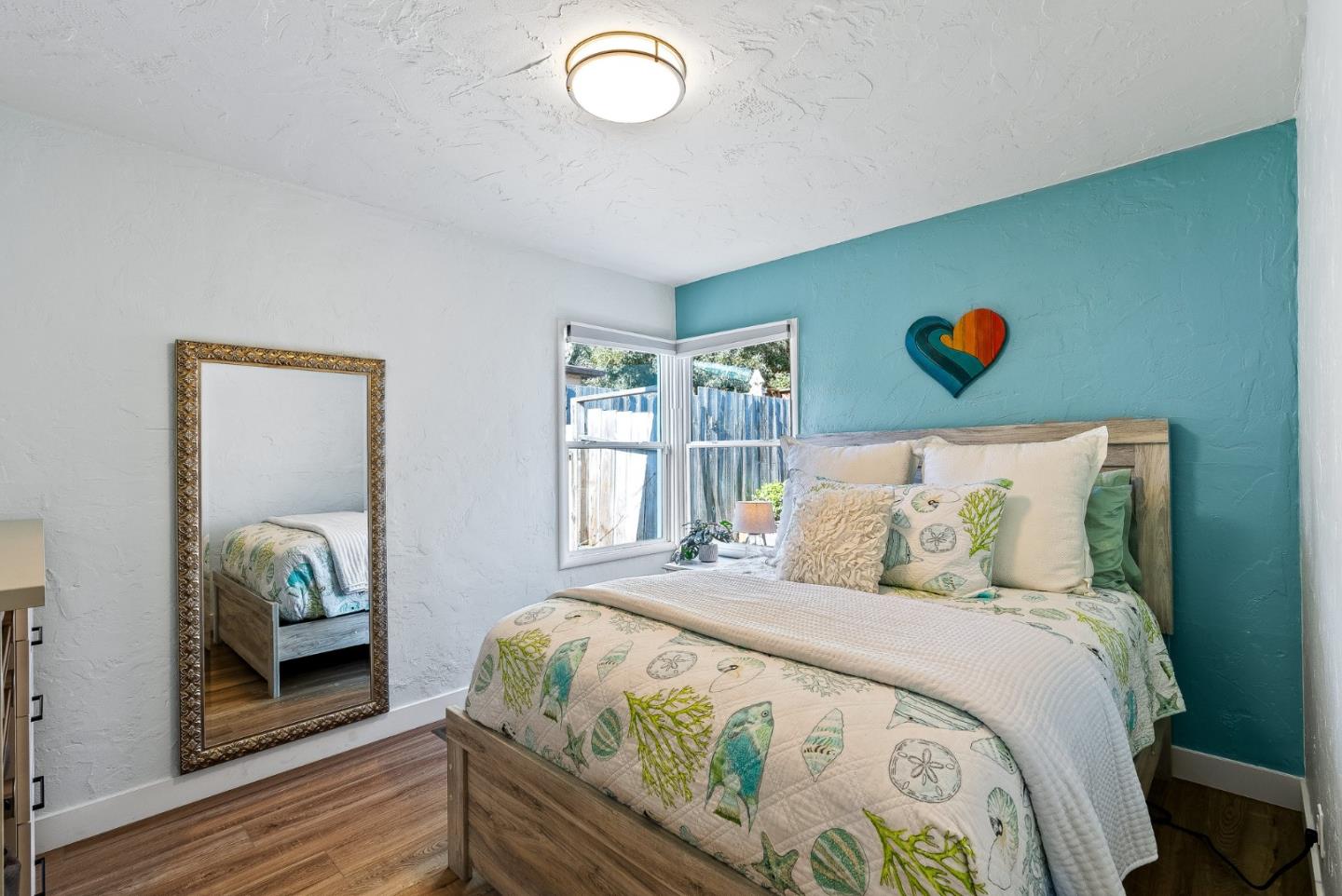 320 Hillcrest Drive Aptos, CA 95003 - Photo 17 of 36 a bedroom with a bed and window