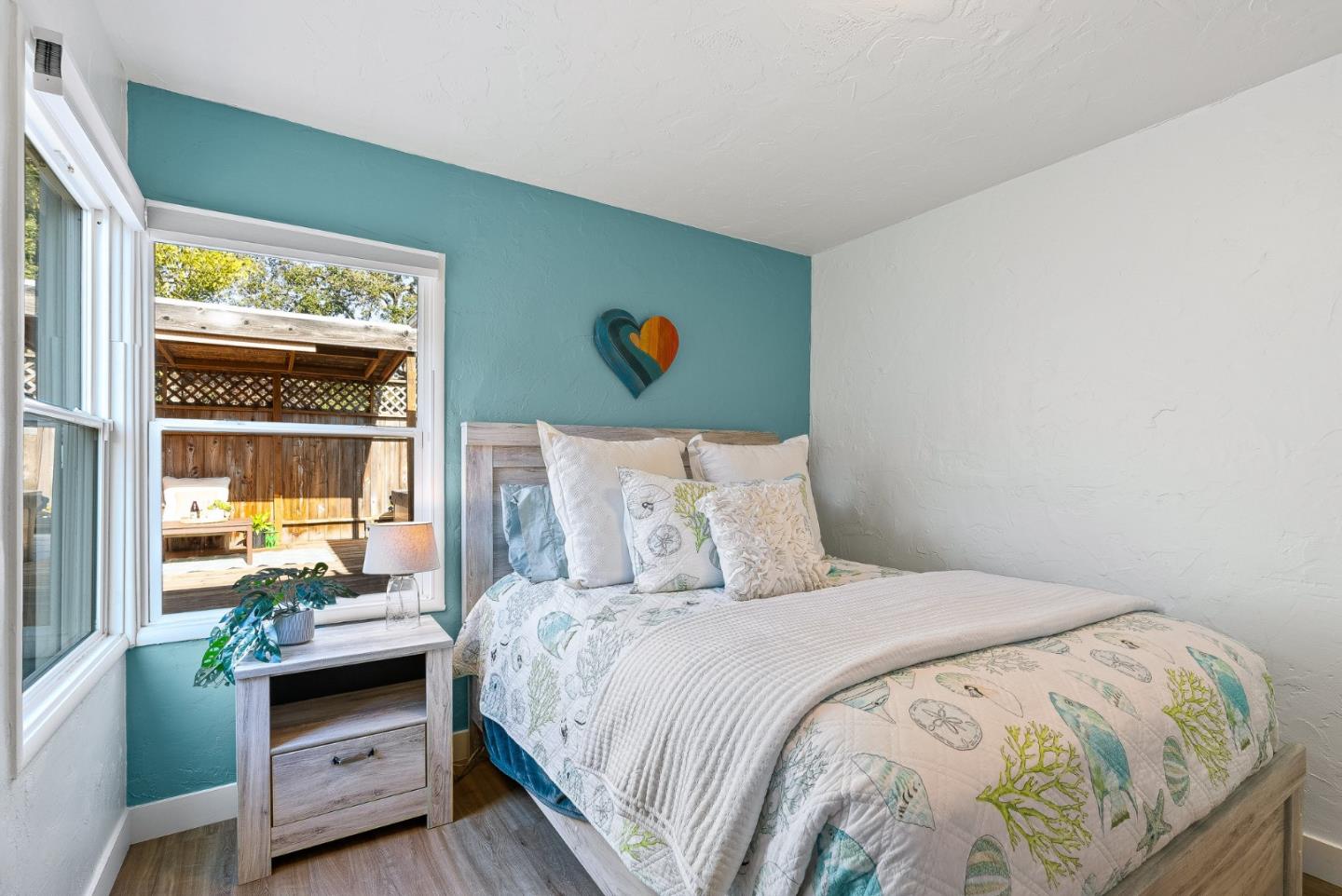 320 Hillcrest Drive Aptos, CA 95003 - Photo 18 of 36 a bedroom with a bed and a window