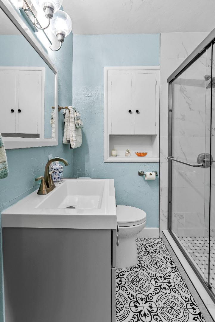 320 Hillcrest Drive Aptos, CA 95003 - Photo 19 of 36 a bathroom with a sink toilet and shower