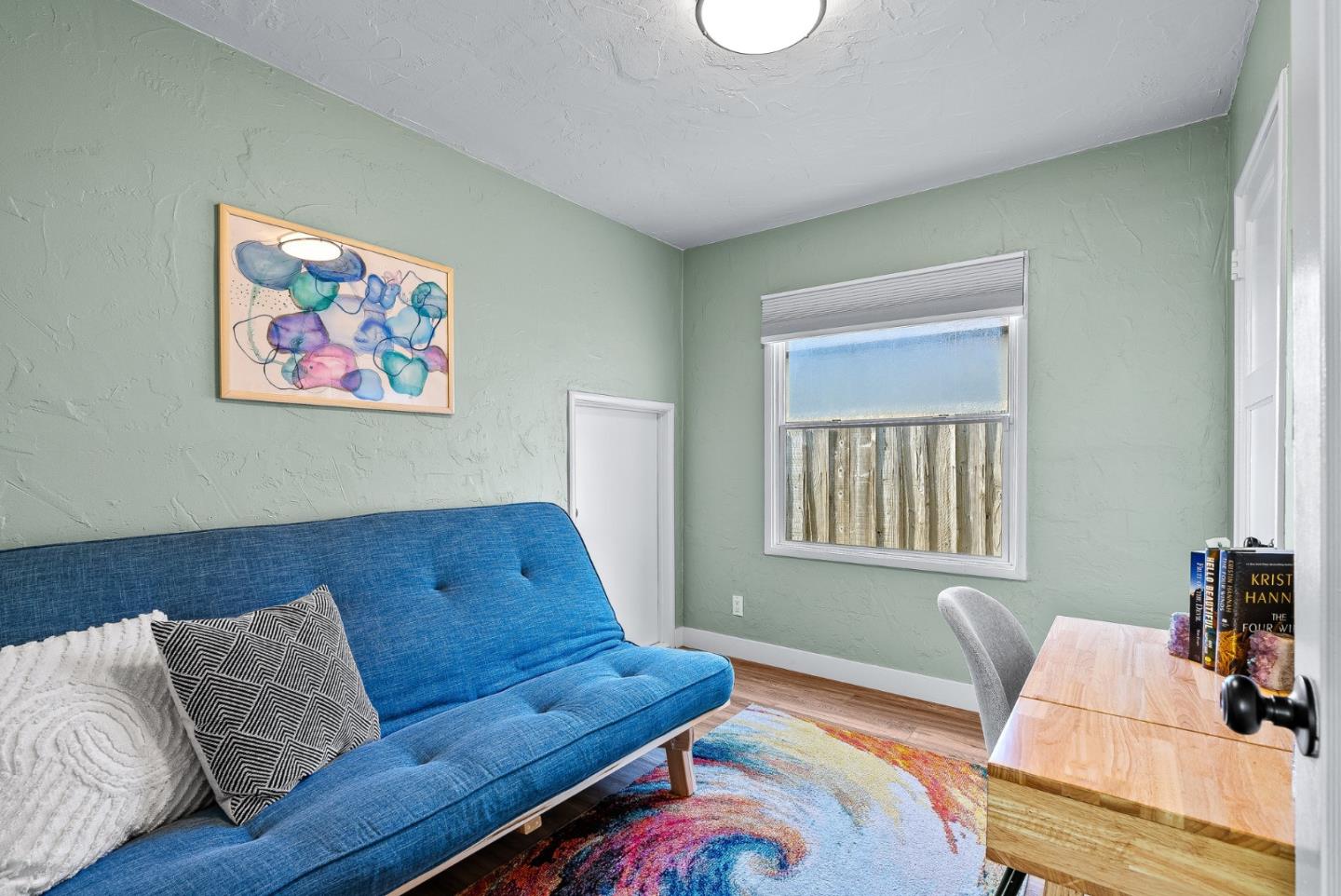 320 Hillcrest Drive Aptos, CA 95003 - Photo 22 of 36 a living room with furniture and a window
