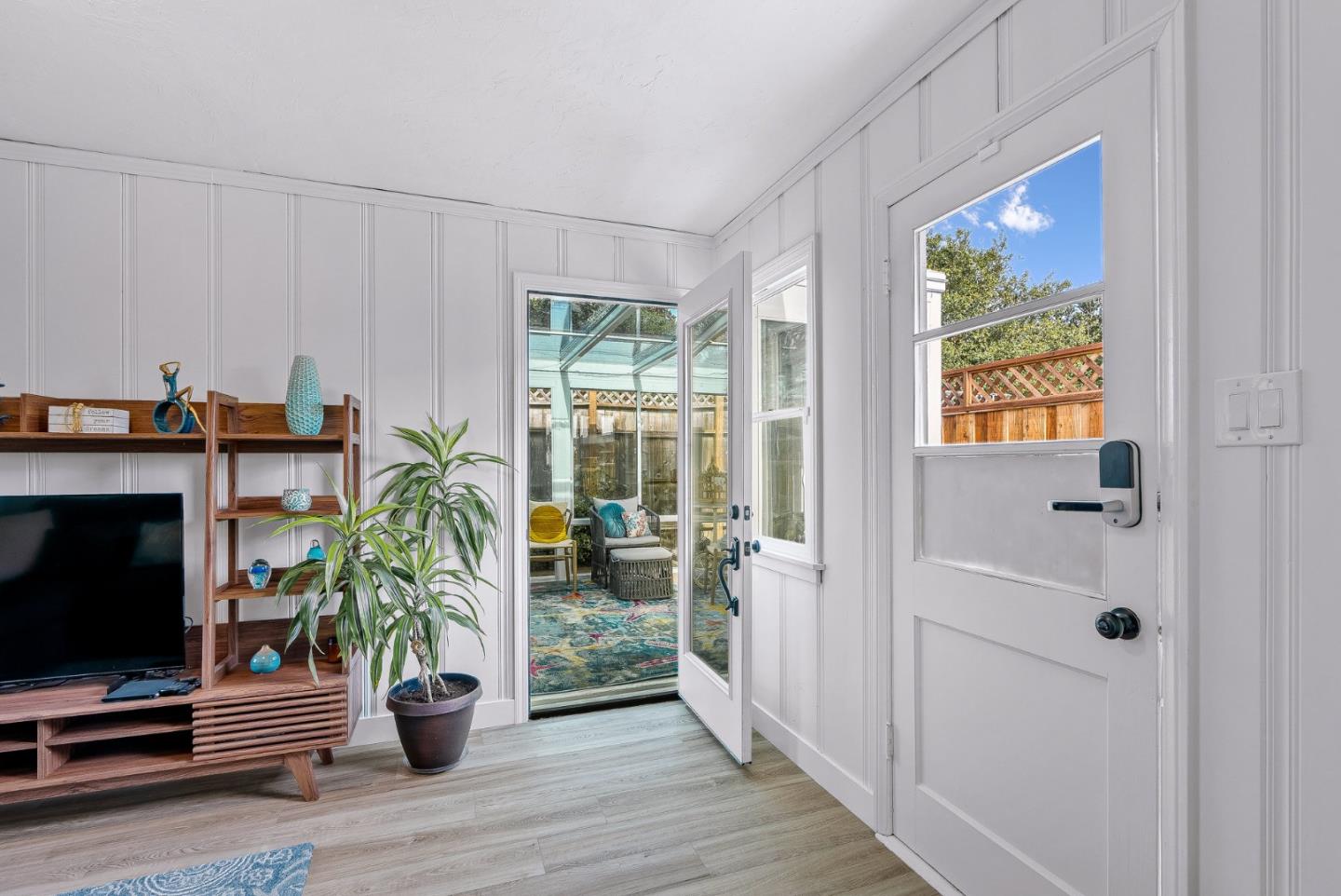 320 Hillcrest Drive Aptos, CA 95003 - Photo 26 of 36 a living room with furniture and a flat screen tv
