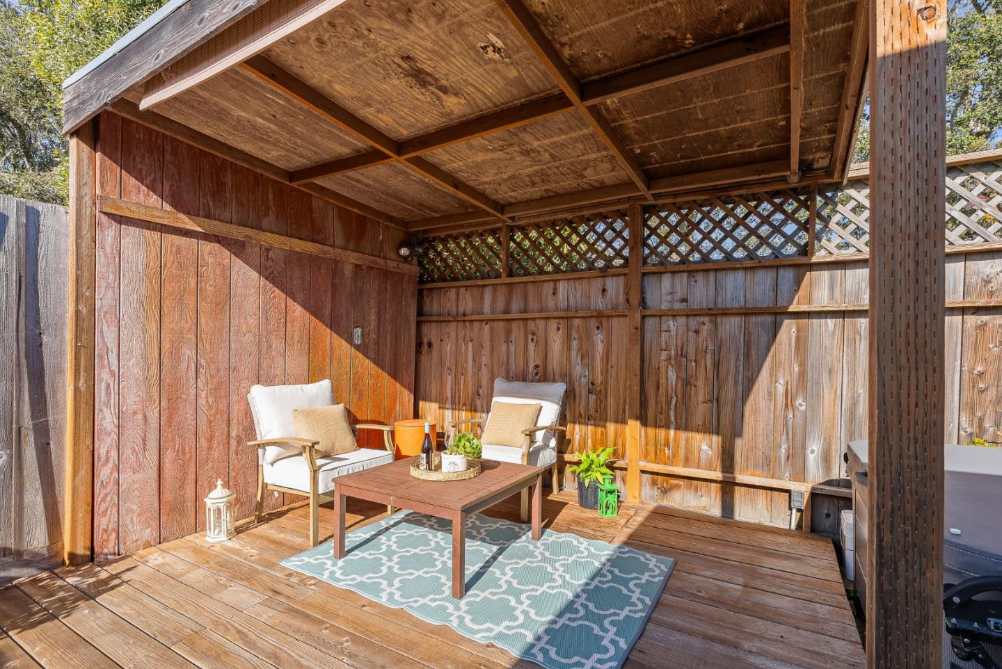 320 Hillcrest Drive Aptos, CA 95003 - Photo 28 of 36 a backyard of a house with table and chairs