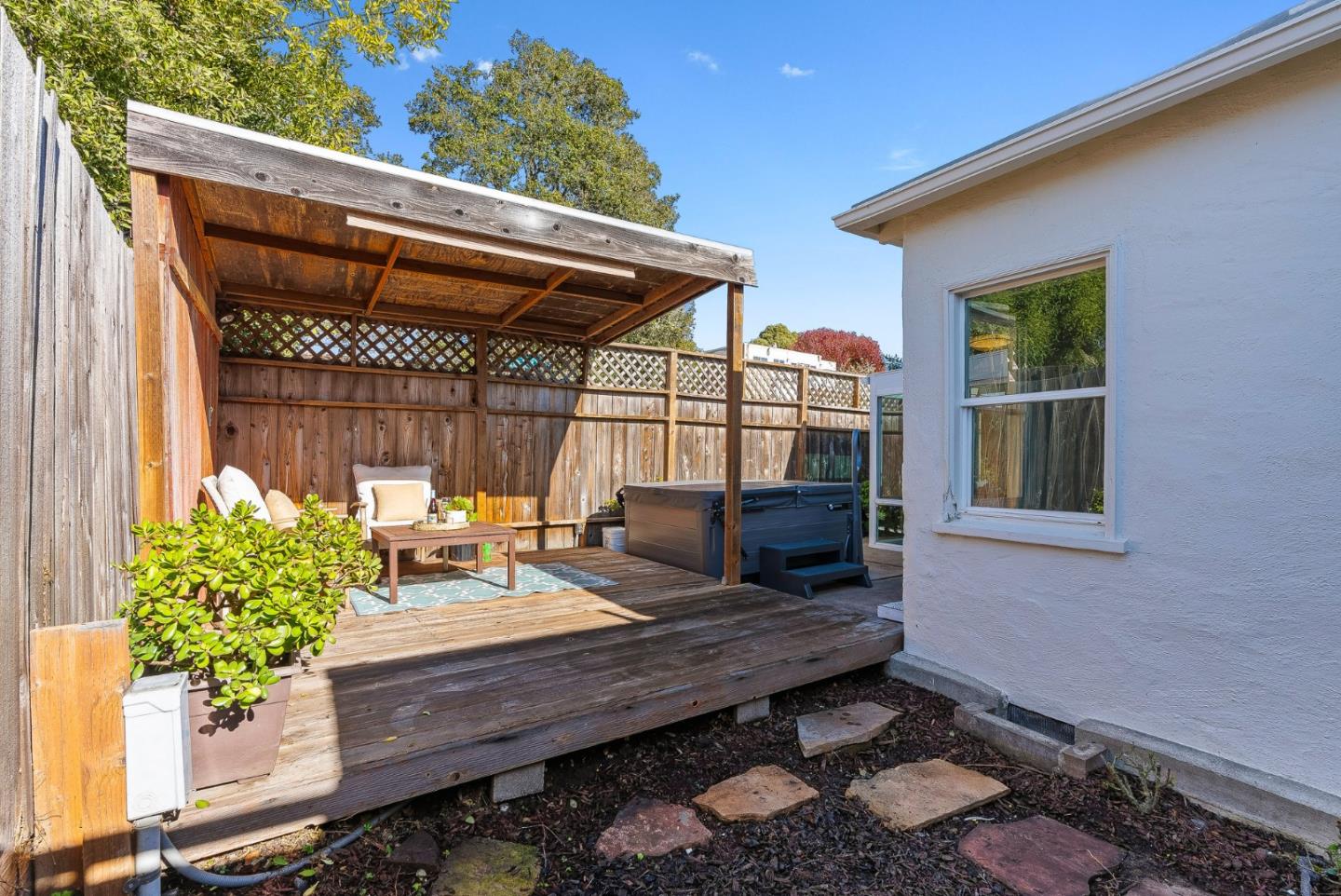 320 Hillcrest Drive Aptos, CA 95003 - Photo 30 of 36 a wooden bench sitting in front of a building