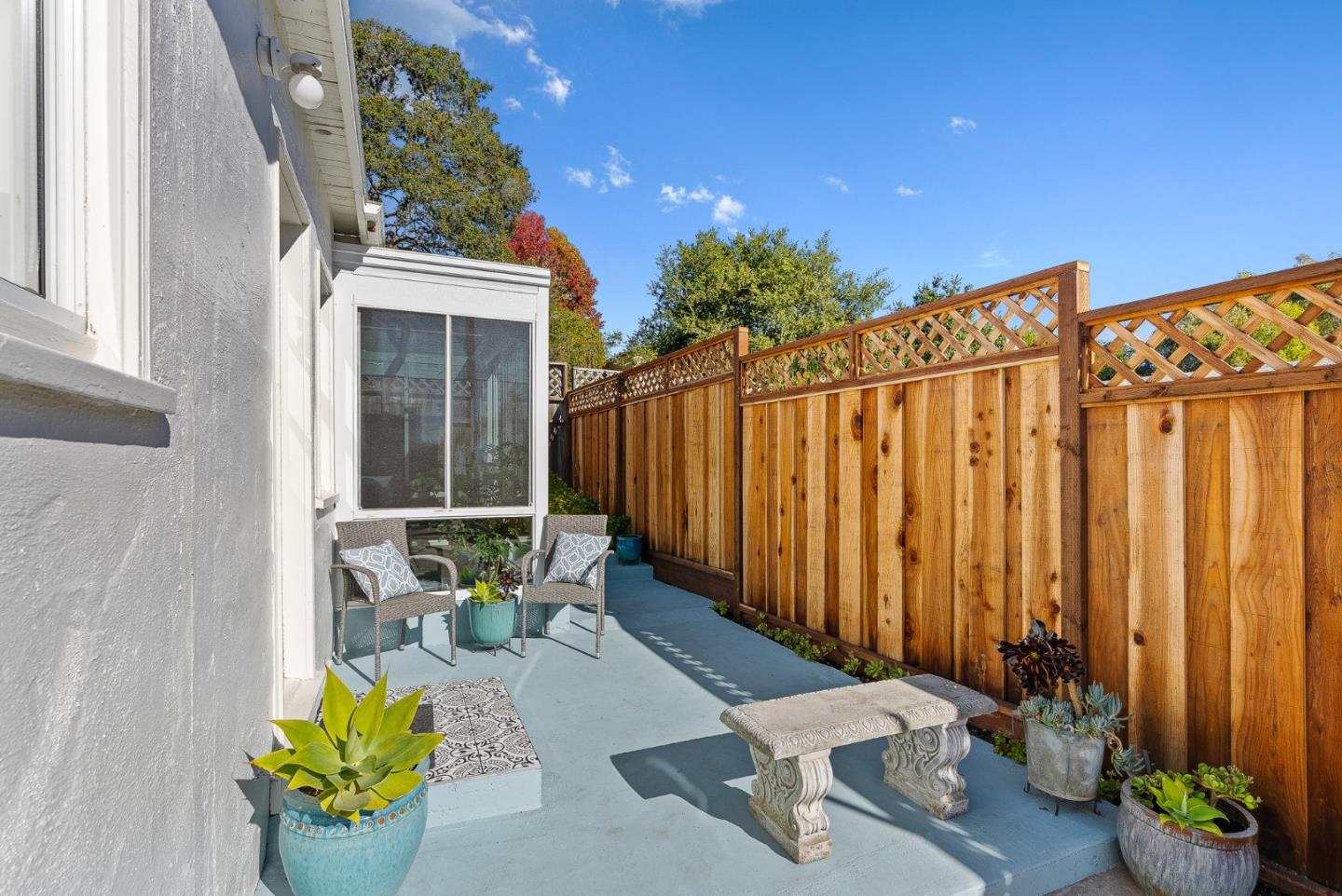320 Hillcrest Drive Aptos, CA 95003 - Photo 7 of 36 a view of a chairs and table in a patio