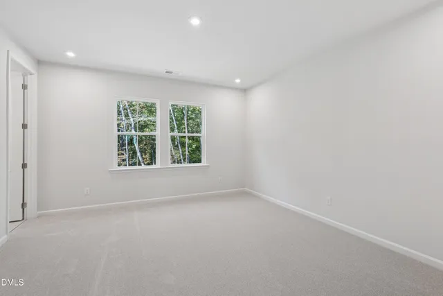 a view of entryway with wooden floor and stairs
