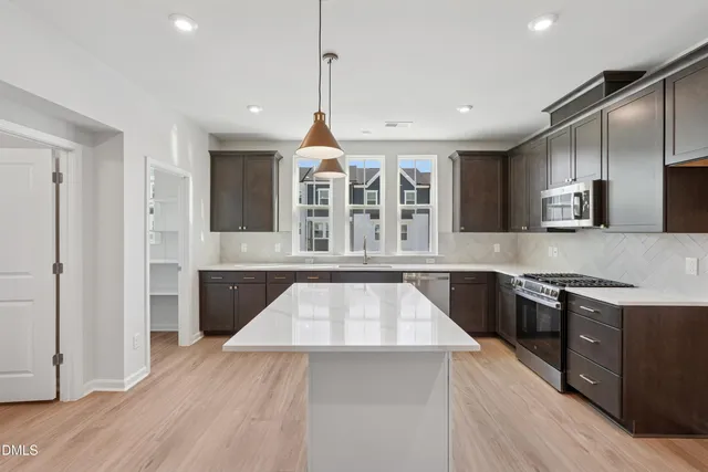 a view of a house with yard porch and furniture