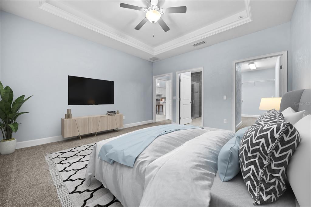 1088 Northwest 126 Way Newberry, FL 32669 - Photo 15 of 29 a bedroom with a bed and a flat screen tv