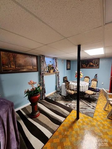 a gym room with lots of furniture