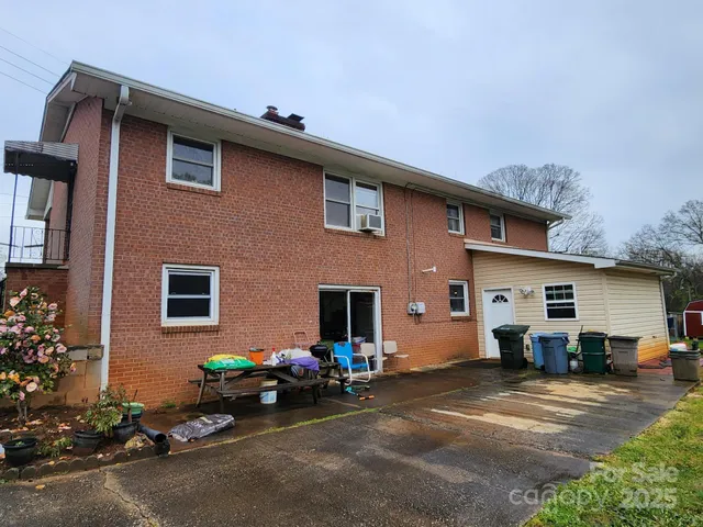 a front view of a house with yard